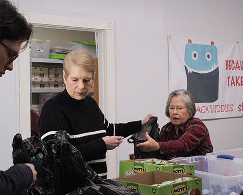People Packing Food
